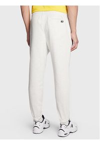 New Balance Spodnie dresowe MP23504 Szary Athletic Fit. Kolor: szary. Materiał: dresówka, bawełna