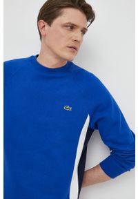 Lacoste bluza męska kolor niebieski wzorzysta. Kolor: niebieski. Materiał: dzianina. Długość rękawa: raglanowy rękaw. Wzór: aplikacja #3