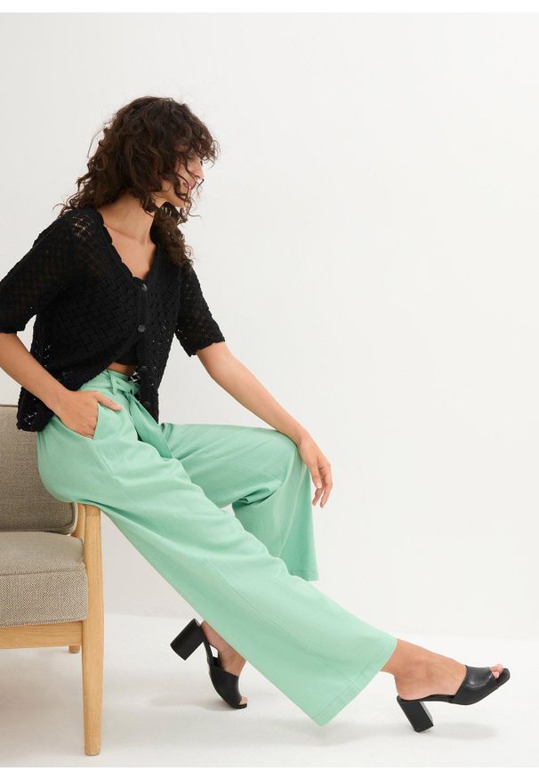 bonprix - Spodnie culotte z przewiewnej mieszanki lnu. Kolor: zielony. Materiał: len