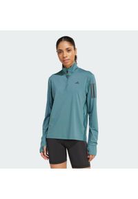 Adidas - Kurtka Own the Run Half-Zip. Kolor: niebieski. Materiał: materiał. Sport: bieganie