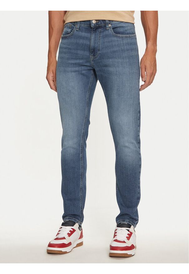 Tommy Jeans Jeansy Austin DM0DM21053 Niebieski Slim Tapered Fit. Kolor: niebieski