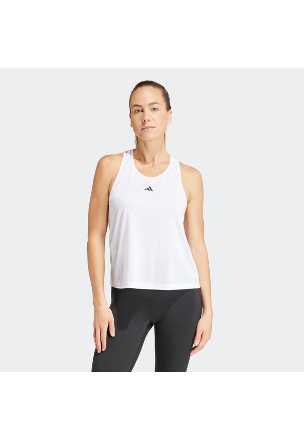 Adidas - Koszulka fitness damska ADIDAS bez rękawów. Kolor: biały. Materiał: materiał, skóra. Długość rękawa: bez rękawów. Sport: fitness