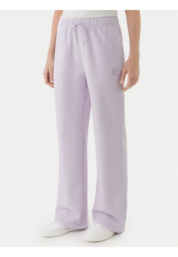 Calvin Klein Jeans Spodnie dresowe Embossed Monologo LV047F206G Różowy Regular Fit. Kolor: różowy. Materiał: bawełna