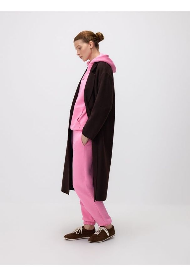 Reserved - Spodnie dresowe z bawełny - różowy. Kolor: różowy. Materiał: bawełna, dresówka