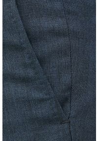 TOMMY HILFIGER - Tommy Hilfiger Spodnie wełniane męskie kolor granatowy dopasowane. Kolor: niebieski. Materiał: wełna. Wzór: gładki #4