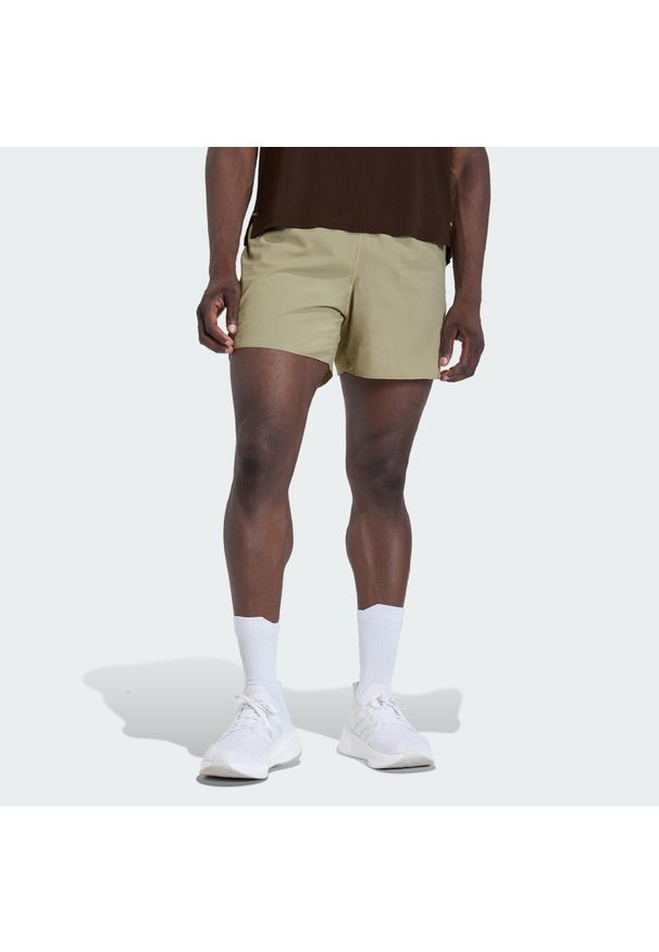 Adidas - Szorty adi365 FORMOTION. Kolor: beżowy. Sport: bieganie, fitness