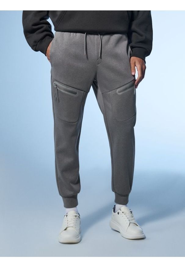Sinsay - Spodnie dresowe jogger - szary. Kolor: szary. Materiał: dresówka