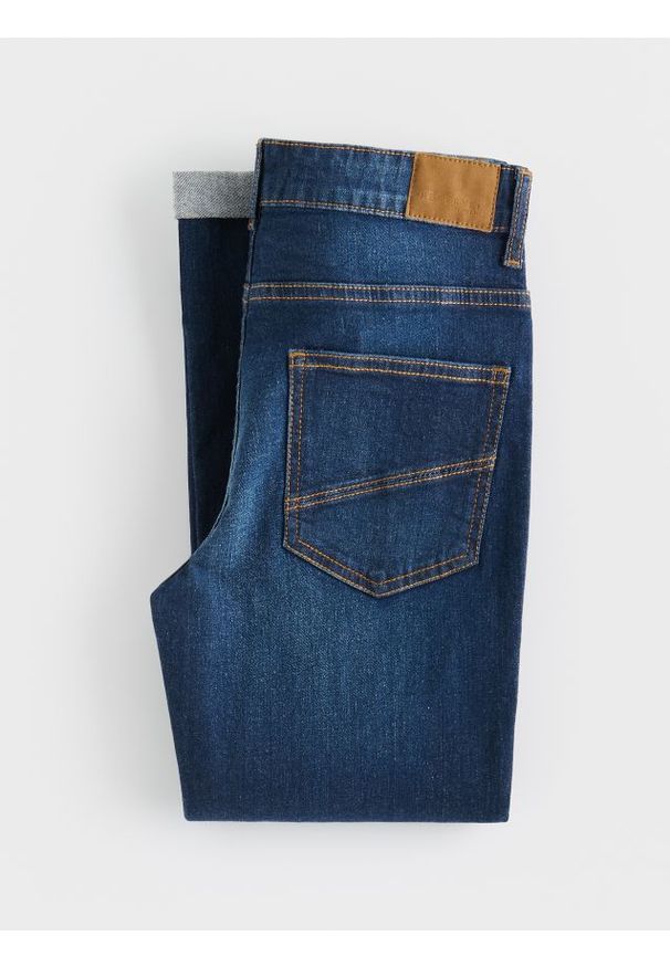 Reserved - Jeansy regular fit - granatowy. Kolor: niebieski