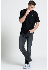 Lacoste T-shirt TH7618 kolor czarny gładki TH7618-001. Okazja: na co dzień. Kolor: czarny. Materiał: dzianina. Wzór: gładki. Styl: casual #3