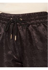 Guess Spodnie dresowe V5YB14 WHFU0 Czarny Regular Fit. Kolor: czarny. Materiał: syntetyk #5