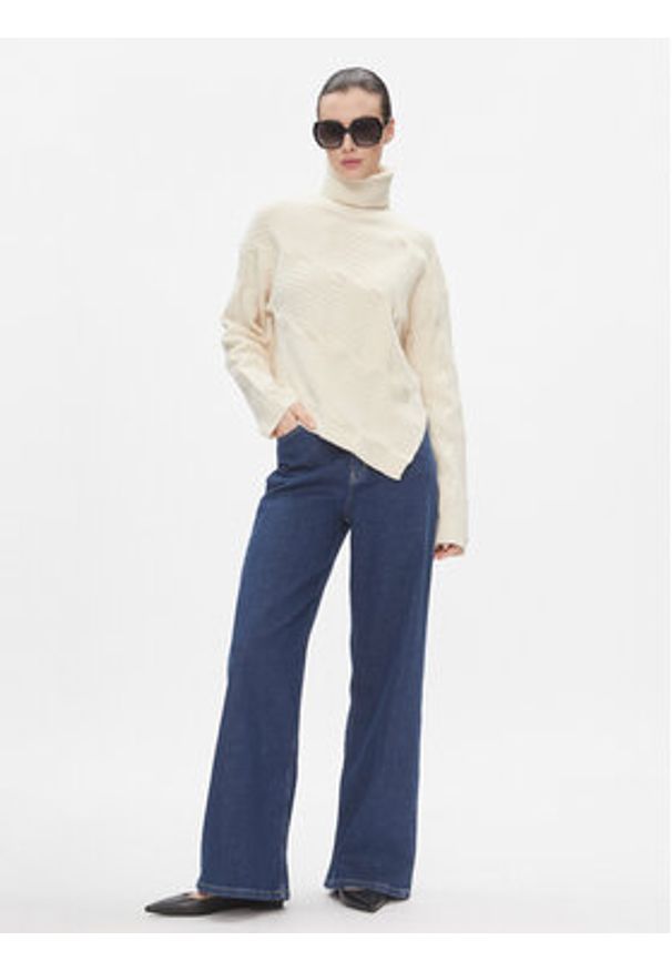 Calvin Klein Sweter Asymetric Modern Cable Sweater K20K206016 Beżowy Regular Fit. Kolor: beżowy. Materiał: syntetyk