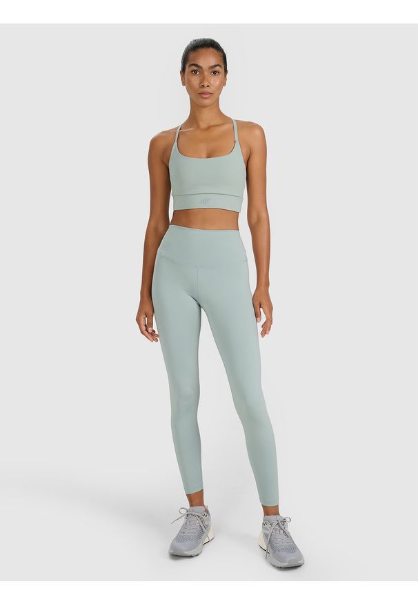 4f - 4F Legginsy treningowe szybkoschnące damskie - zielone XS. Stan: podwyższony. Kolor: zielony. Materiał: dzianina, materiał, syntetyk, włókno, elastan. Wzór: gładki, ze splotem. Sport: fitness