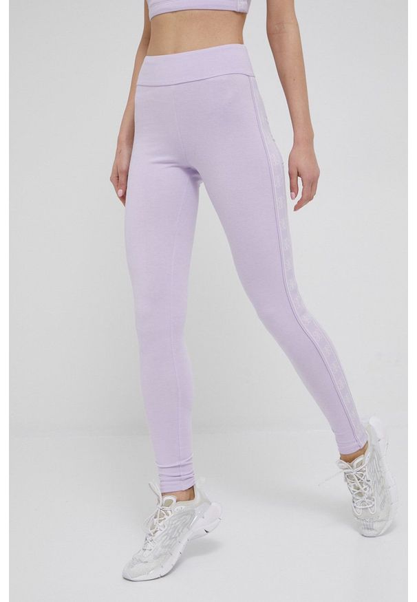 Guess legginsy damskie kolor fioletowy z aplikacją. Stan: podwyższony. Kolor: fioletowy. Materiał: poliester. Wzór: aplikacja