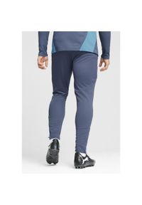 Puma - Męskie spodnie treningowe Manchester City PUMA Inky Blue Magic. Kolor: niebieski