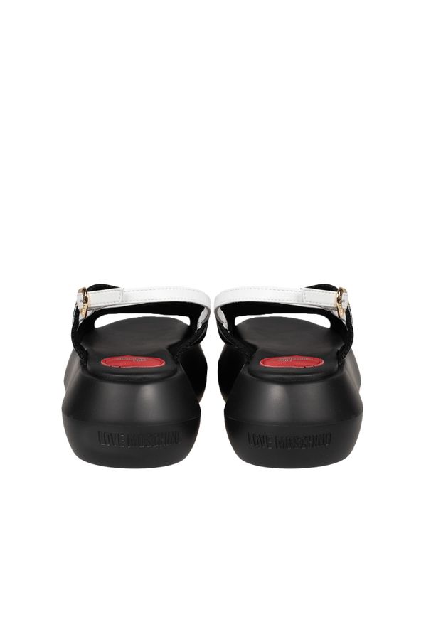 Love Moschino Sandały | JA16257I0IIX6 | Kobieta | Czarny, Biały. Okazja: na spacer, na co dzień. Zapięcie: pasek. Kolor: wielokolorowy, biały, czarny. Materiał: skóra. Wzór: nadruk. Styl: casual, elegancki