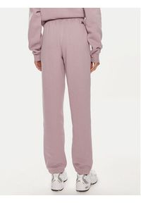 New Balance Spodnie dresowe Graphic WP43500 Fioletowy Relaxed Fit. Kolor: fioletowy. Materiał: bawełna #5