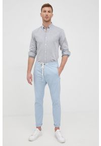 Drykorn spodnie męskie dopasowane. Kolor: niebieski. Materiał: tkanina, bawełna
