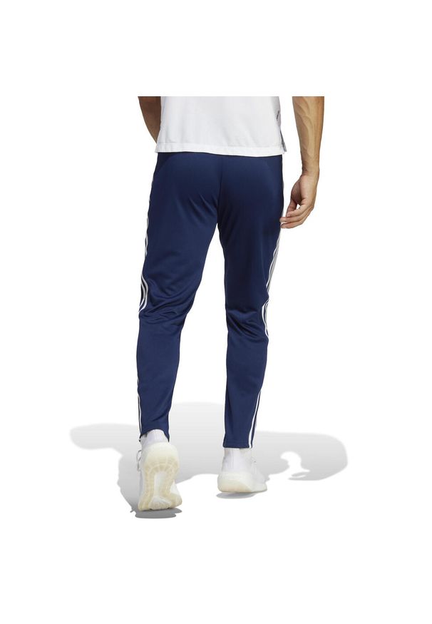 Adidas - Spodnie fitness męskie ADIDAS. Materiał: dresówka, materiał, skóra. Sport: fitness