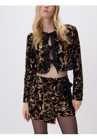Reserved - Cekinowa marynarka z kokardami - czarny. Typ kołnierza: kokarda. Kolor: czarny. Materiał: dzianina. Długość: krótkie #1