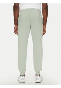Jack & Jones - Jack&Jones Spodnie dresowe Gordon 12268442 Zielony Regular Fit. Kolor: zielony. Materiał: bawełna