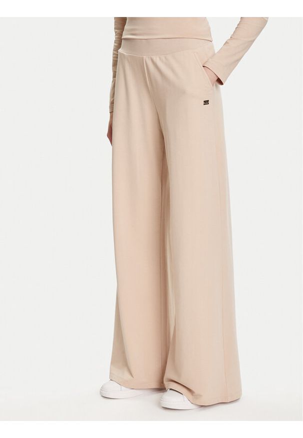 EA7 Emporio Armani Spodnie dresowe 7W000462 AF13135 U1046 Beżowy Relaxed Fit. Kolor: beżowy. Materiał: bawełna