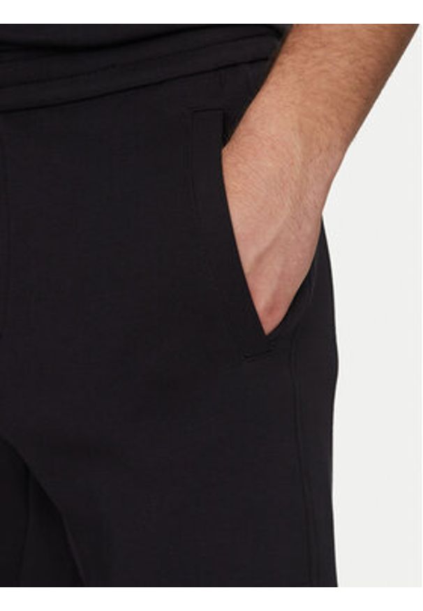 Armani Exchange Spodnie dresowe XM000354 AF10818 UB101 Granatowy Regular Fit. Kolor: niebieski. Materiał: bawełna