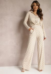 Renee - Beżowe Spodnie o Szerokim Kroju w Ozdobny Print z Kieszeniami Ashel. Okazja: na co dzień. Kolor: beżowy. Wzór: nadruk. Styl: elegancki, casual