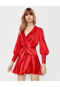 ZIMMERMANN - Czerwona sukienka z jedwabiu. Okazja: na randkę. Typ kołnierza: dekolt kopertowy. Kolor: czerwony. Materiał: jedwab. Typ sukienki: kopertowe, dopasowane. Długość: mini #1