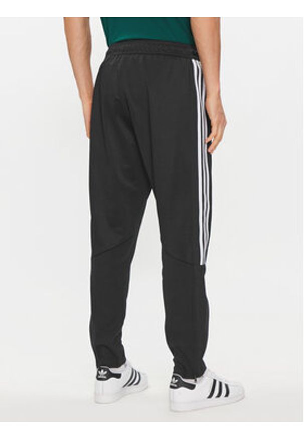 Adidas - adidas Spodnie dresowe Tiro IP3778 Czarny Regular Fit. Kolor: czarny. Materiał: bawełna