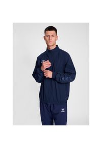Kurtka z dresu Hummel Travel. Kolor: niebieski. Materiał: dresówka #1