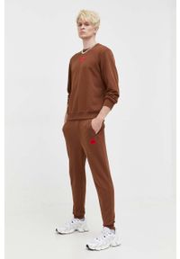 Hugo - HUGO spodnie dresowe bawełniane kolor brązowy melanżowe. Kolor: brązowy. Materiał: bawełna, dresówka, dzianina. Wzór: gładki, melanż #4