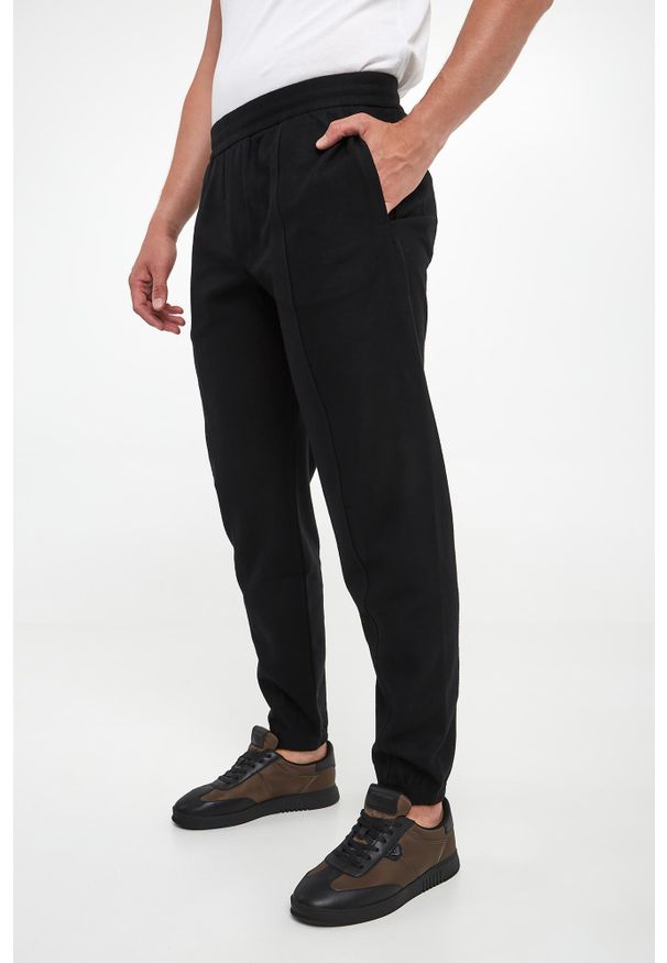 Emporio Armani - Spodnie męskie wełniane EMPORIO ARMANI. Materiał: wełna