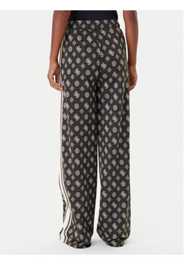 Guess Spodnie dresowe V5YB10 K0282 Zielony Relaxed Fit. Kolor: zielony. Materiał: syntetyk