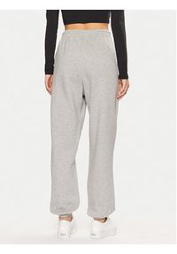 Adidas - adidas Spodnie dresowe Essentials Fleece IY9638 Szary Loose Fit. Kolor: szary. Materiał: bawełna #5
