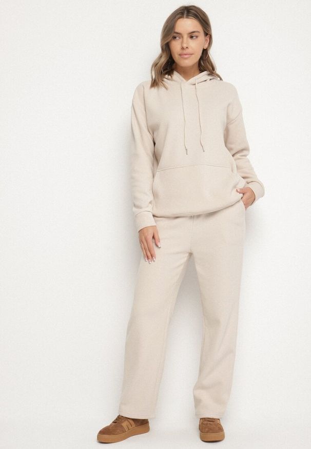 Born2be - Beżowy Bawełniany Komplet Dresowy z Bluzą i Spodniami Zansira. Kolor: beżowy. Materiał: dresówka, bawełna