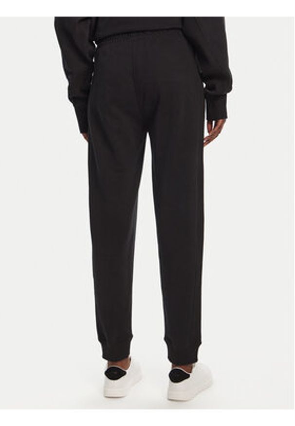 BOSS Spodnie dresowe 50540278 Czarny Regular Fit. Kolor: czarny. Materiał: dresówka