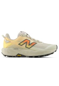 Buty damskie New Balance FuelCell Rebel Trail WRBT6G2 – beżowe. Kolor: beżowy. Materiał: syntetyk, materiał, guma. Szerokość cholewki: normalna. Sport: bieganie, fitness #1