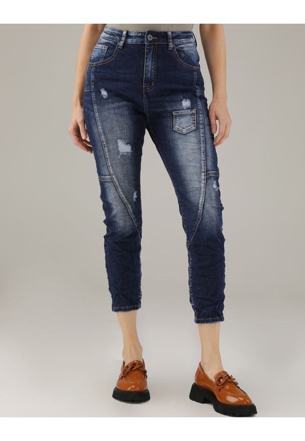 Unisono - SPODNIE Z OZDOBNYMI PRZESZYCIAMI 191-RS2051 JEANS. Materiał: jeans