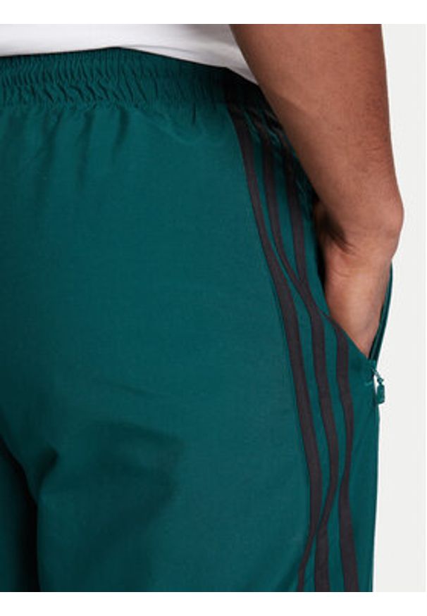 Adidas - adidas Spodnie dresowe Brushed JX3079 Zielony Regular Fit. Kolor: zielony. Materiał: syntetyk