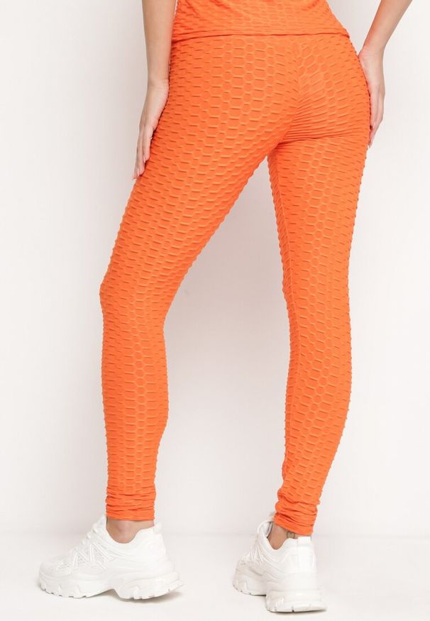 Born2be - Pomarańczowe Legginsy Sportowe z Elastyczną Gumką i Tłoczonym Wzorem Ardisa. Okazja: na co dzień. Kolor: pomarańczowy. Styl: sportowy