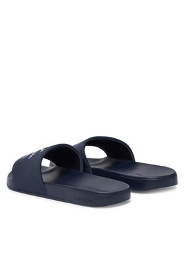 Calvin Klein Klapki Ess Slide Cv YM0YM01393 Granatowy. Kolor: niebieski. Materiał: materiał