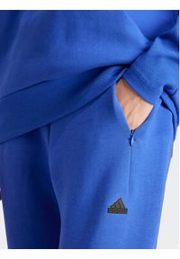 Adidas - adidas Spodnie dresowe Z.N.E. IS3914 Niebieski Regular Fit. Kolor: niebieski. Materiał: bawełna, syntetyk #4