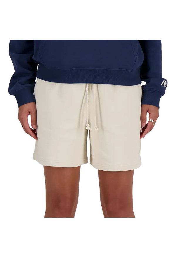 Spodenki damskie New Balance WS41508LIN - beżowe. Kolor: beżowy. Materiał: bawełna, dresówka. Długość: krótkie