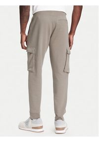 Guess Spodnie dresowe Z4YB08 KAIJ1 Khaki Regular Fit. Kolor: brązowy. Materiał: bawełna
