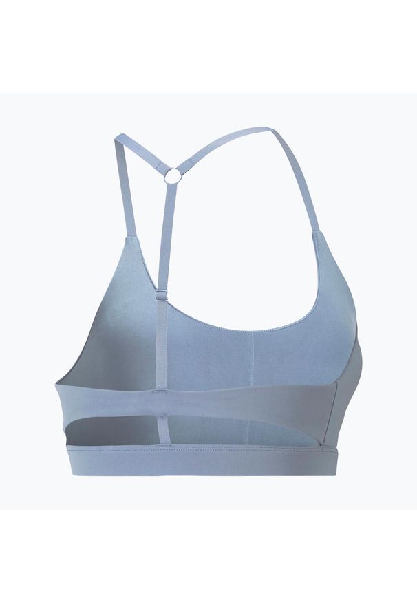 Puma - Stanik fitness cardio damski PUMA Studio Ultrabare Strappy. Kolor: niebieski. Sport: fitness