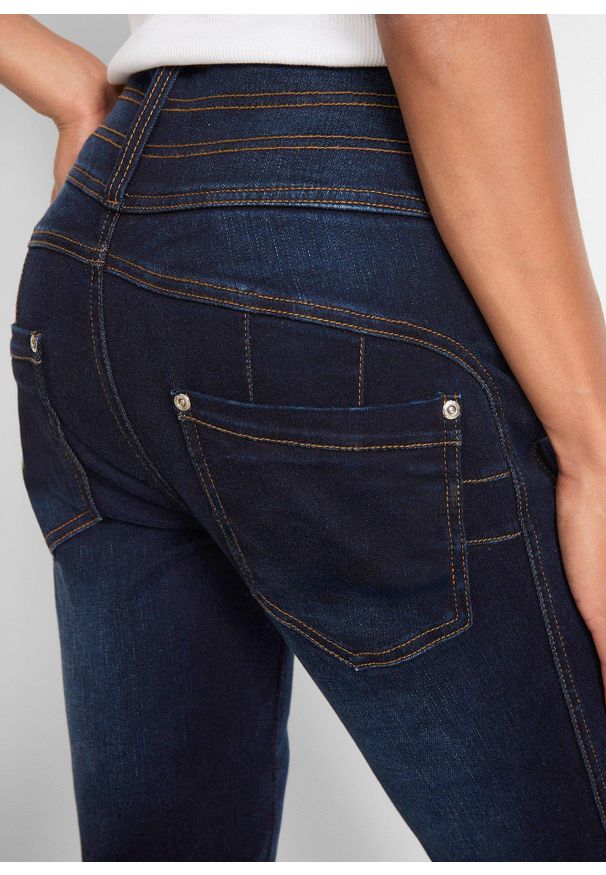 bonprix - Modelujące dżinsy, krój bootcut. Kolor: niebieski