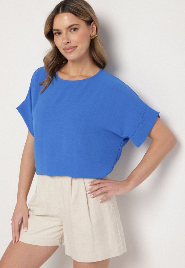 Born2be - Niebieska Bluzka o Kroju Nietoperza Faderia. Okazja: na co dzień. Kolor: niebieski. Materiał: jeans. Styl: casual