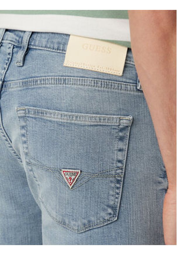Guess Jeansy M6GAS2 D1118 Niebieski jasny Slim Tapered Fit. Kolor: niebieski