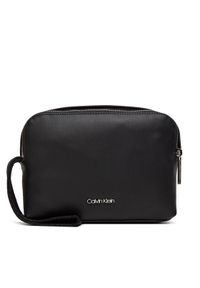 Calvin Klein Saszetka Ck Est. Pu Compact Case K50K512109 Czarny. Kolor: czarny. Materiał: skóra
