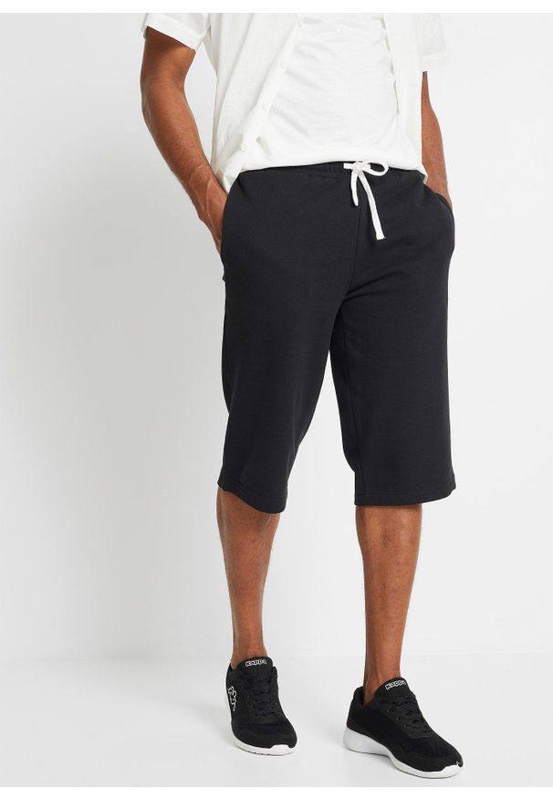 bonprix - Długie bermudy dresowe. Kolor: czarny. Materiał: dresówka. Długość: długie